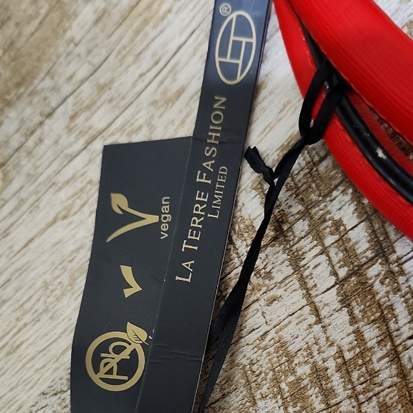 Chic Red Handbag with Gold Accents - Picture 2 of 13